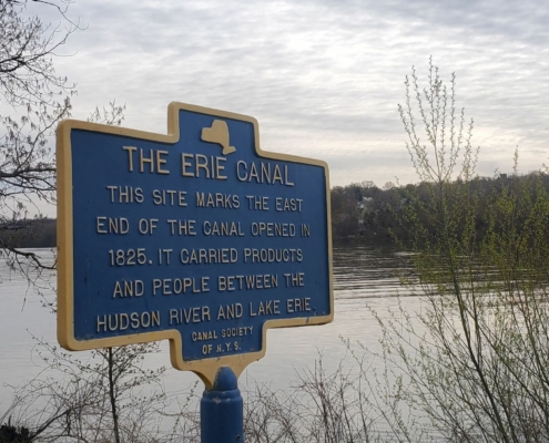 Sign marking end of Erie Canal