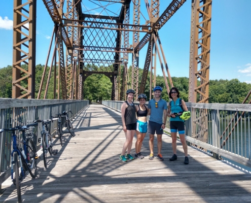 Family on North County Trailway bridge
